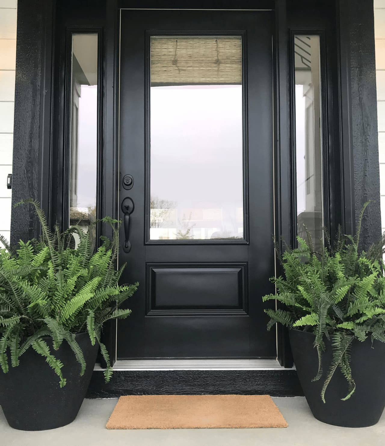pose de porte d'entrée vitrée Angers